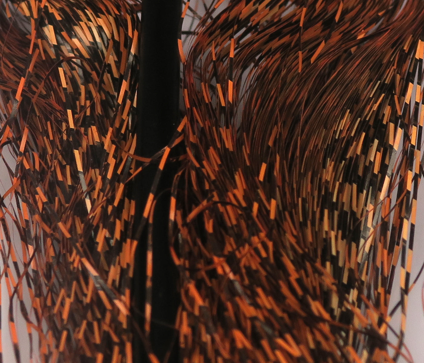Hareline micro black-barred Voodoo fibers, fine orange and black barred synthetic strands with metallic flash for fly tying
