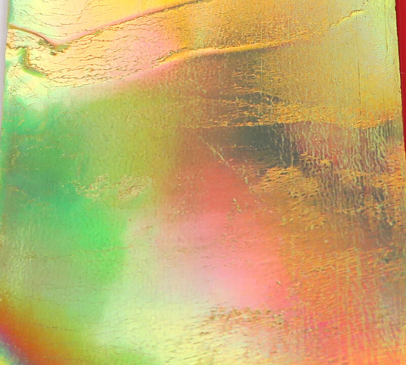 Iridescent holographic silicone Sili Skin sheet with green, gold and pink tones, textured reflective finish for fly tying