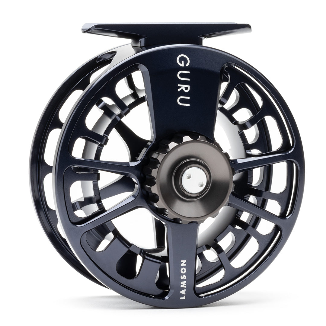 Lamson Guru X black fly reel with perforated disc design and large arbor spool for saltwater and freshwater fishing