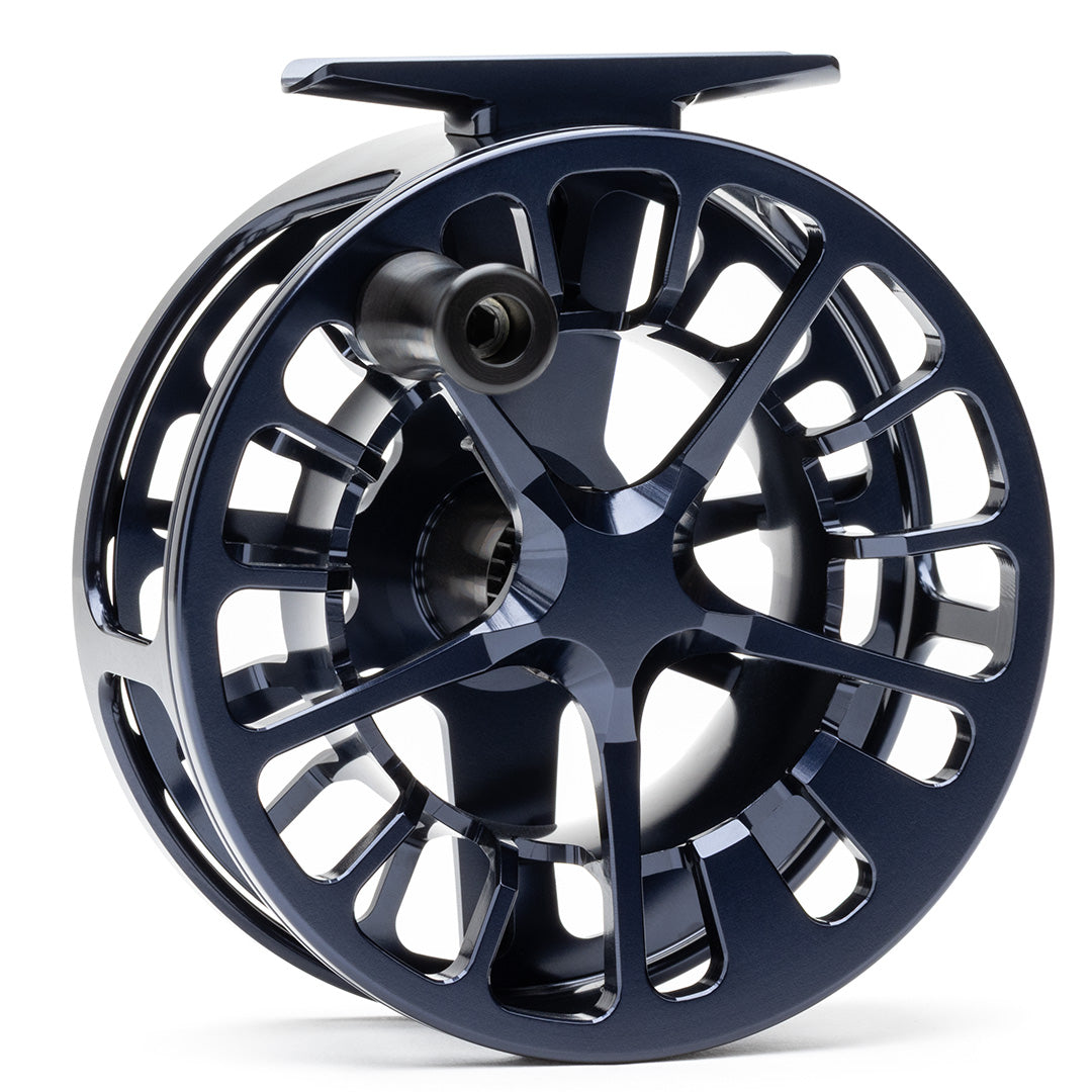 Lamson Guru X HD navy fly reel with large arbor spool design and sealed drag system for freshwater and saltwater fishing