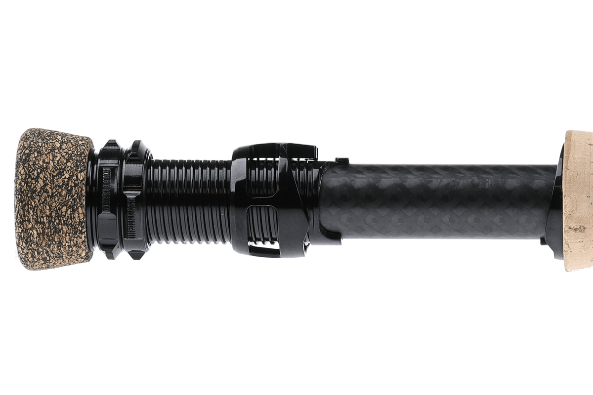 Hardy Firecrest fly rod with black carbon fiber blank, cork handle, and textured reel seat components displayed against