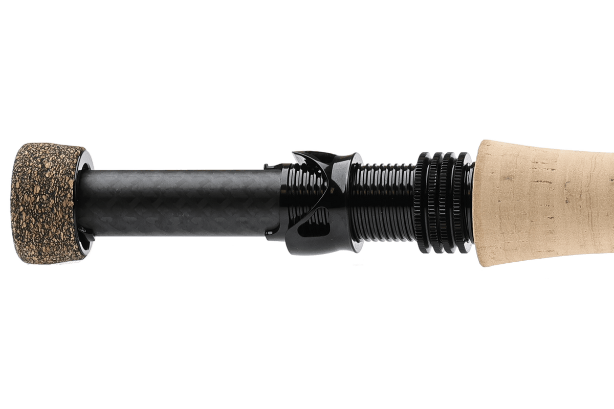 Hardy Tactus Dry Fly Rod disassembled showing cork handle, black graphite shaft, and textured reel seat components on white