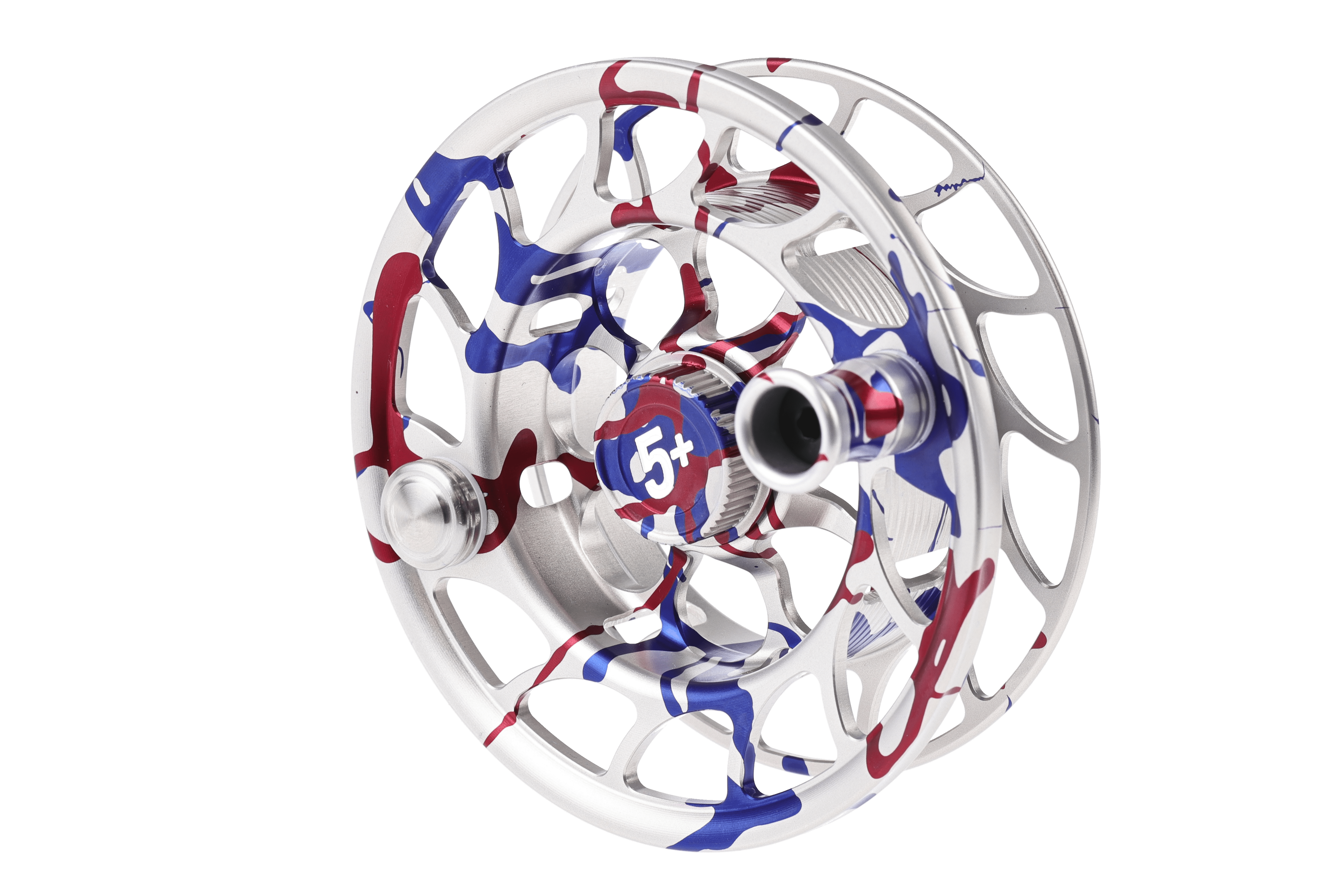 Silver machined aluminum fly reel with red and blue USA 250th camouflage splatter, large ported spool and knurled drag