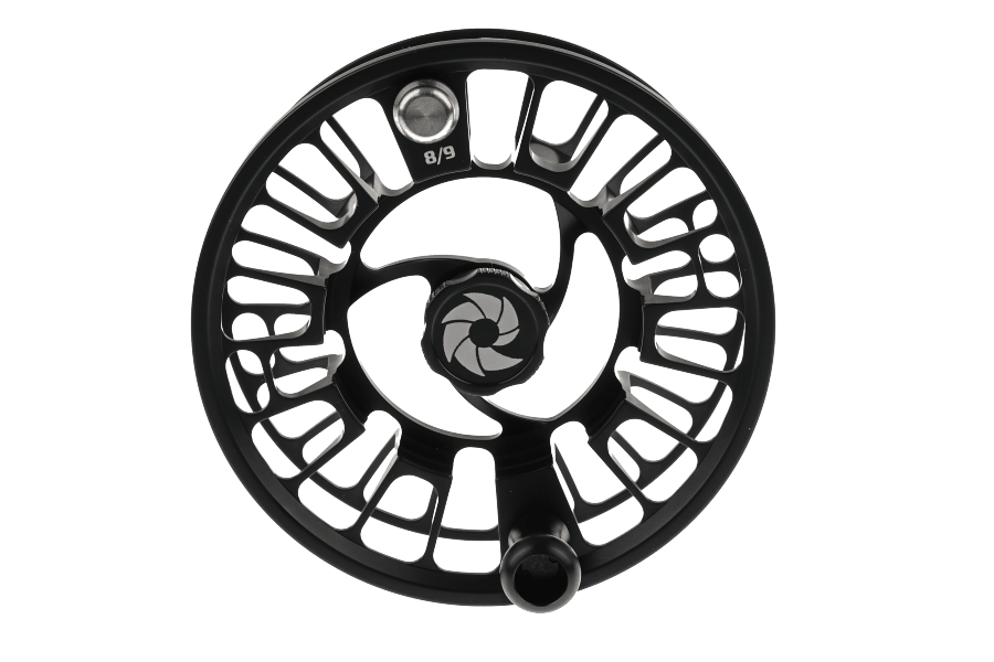 Black anodized fly reel spare spool with open, lattice-cut frame, spiral center detail, and "8/9" line weight marking.