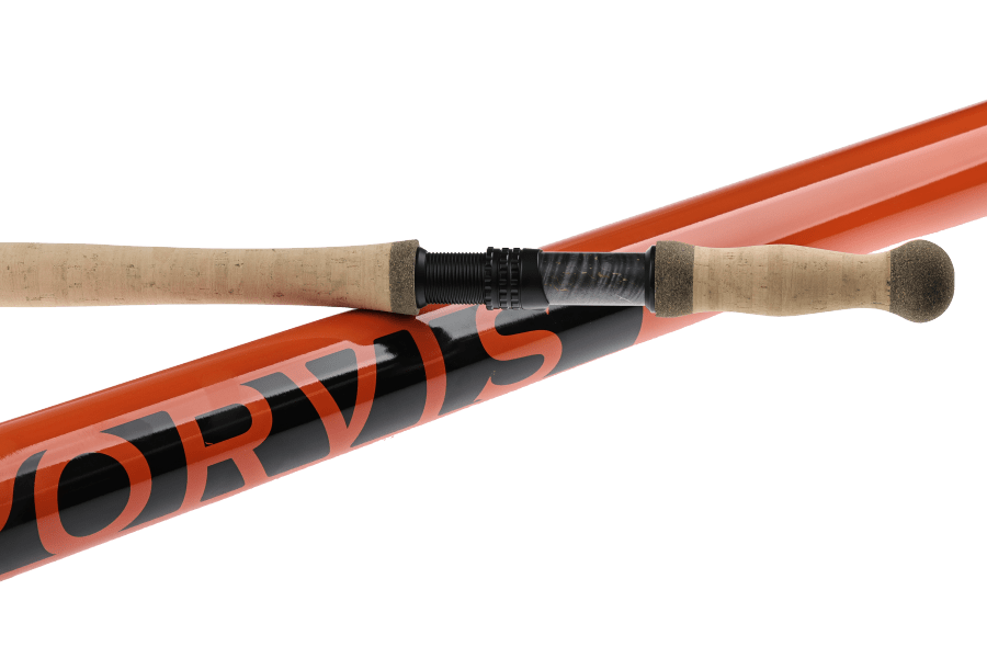 Orange and black Orvis spey rod sections joined at a black ferrule, with cork handles and a rounded fighting butt.
