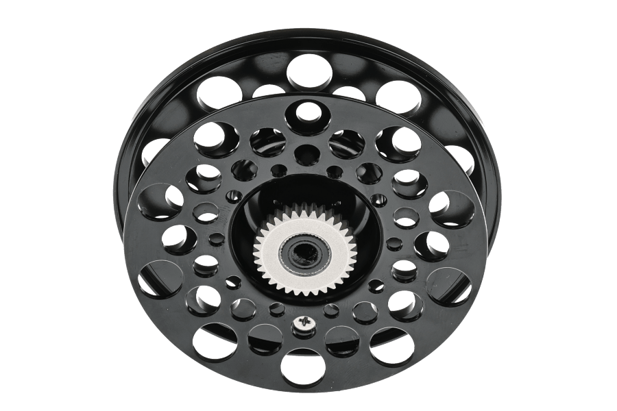 Black anodized aluminum fly reel spare spool with perforated drilled holes and silver gear hub, Redington Classic Trout