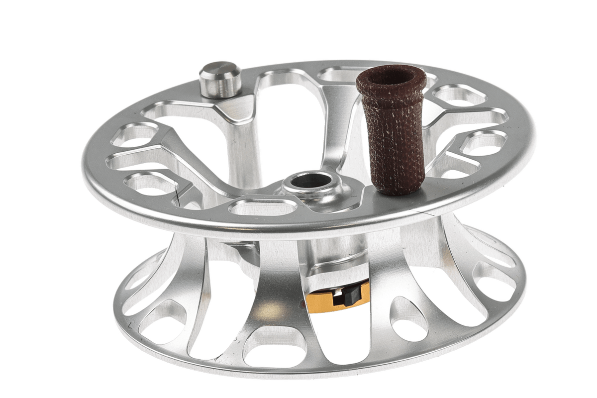 Ross Cimarron LT silver aluminum fly fishing spool with brown arbor, featuring multiple line guides and ventilated design