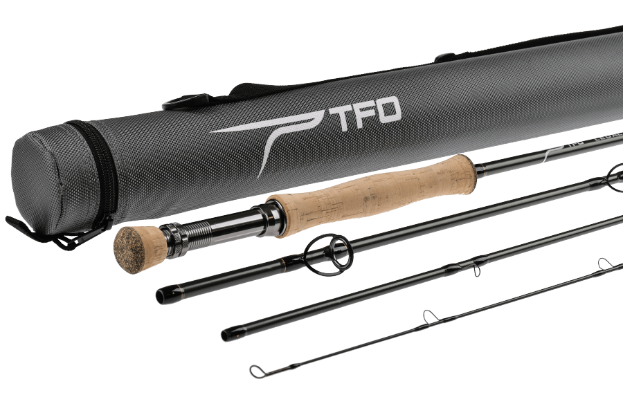 TFO Legacy fly rod in four sections with cork handle, black blank, and gray protective rod tube with silver TFO logo.