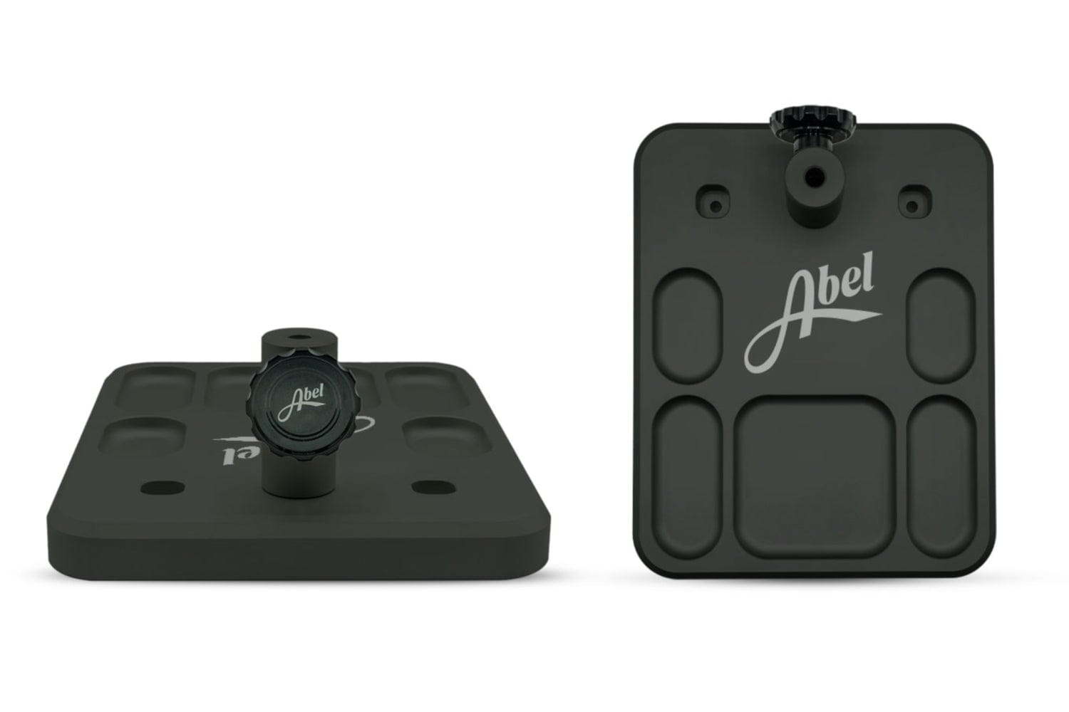 Matte dark gray Abel vise base metal plate with central mounting post, textured knob and recessed tray pockets