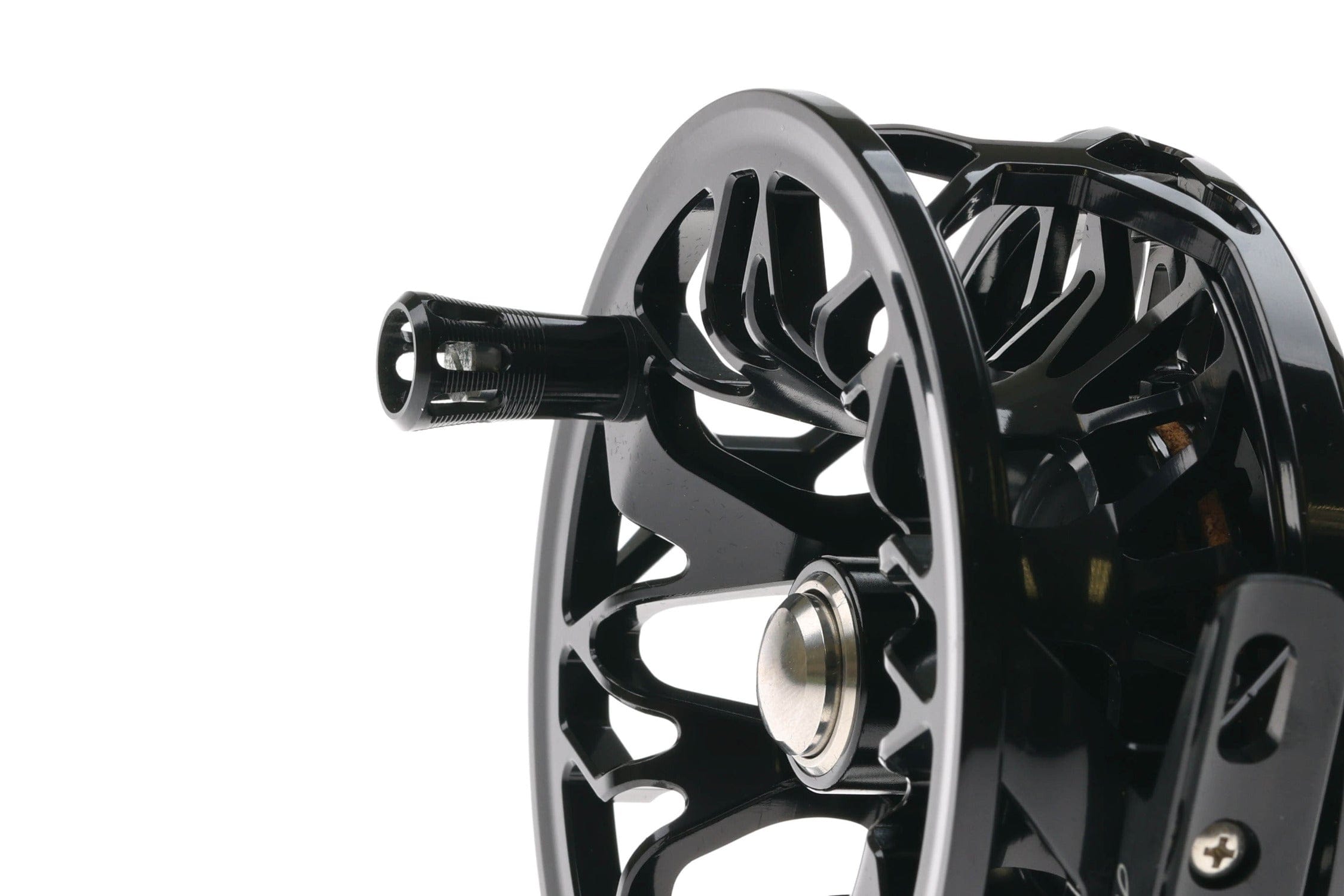 Glossy black Abel Rove fly reel with machined aluminum spool, skeleton cutouts, knurled handle and silver drag knob
