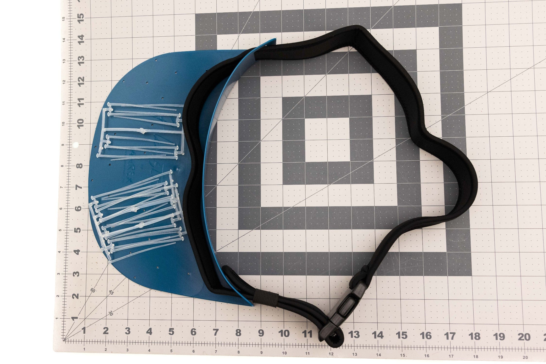 Ahrex Flexistripper line basket, blue curved plastic plate with clear line holders and black padded adjustable neoprene strap