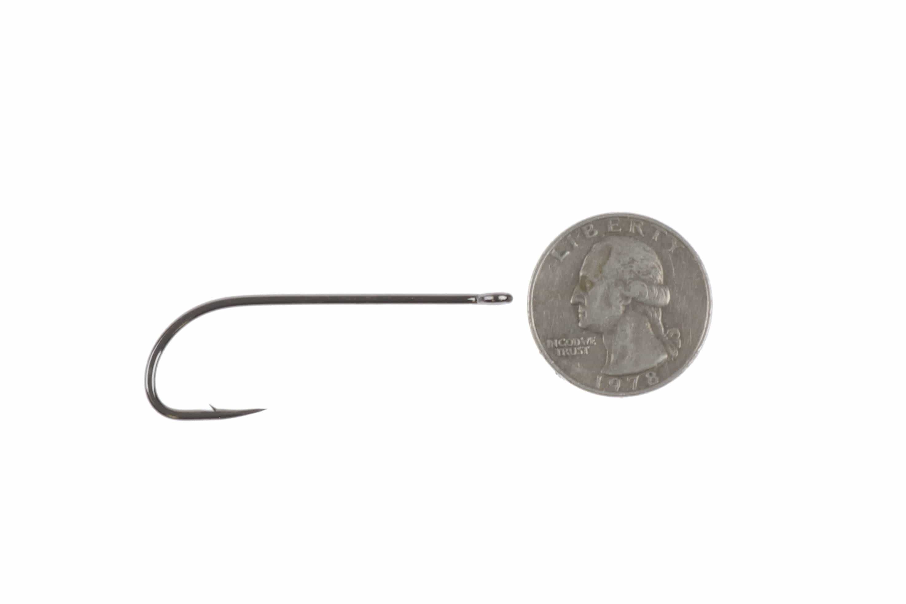 Ahrex Patagon streamer hook, black nickel long-shank fly tying hook with wide gap and barb beside quarter for scale