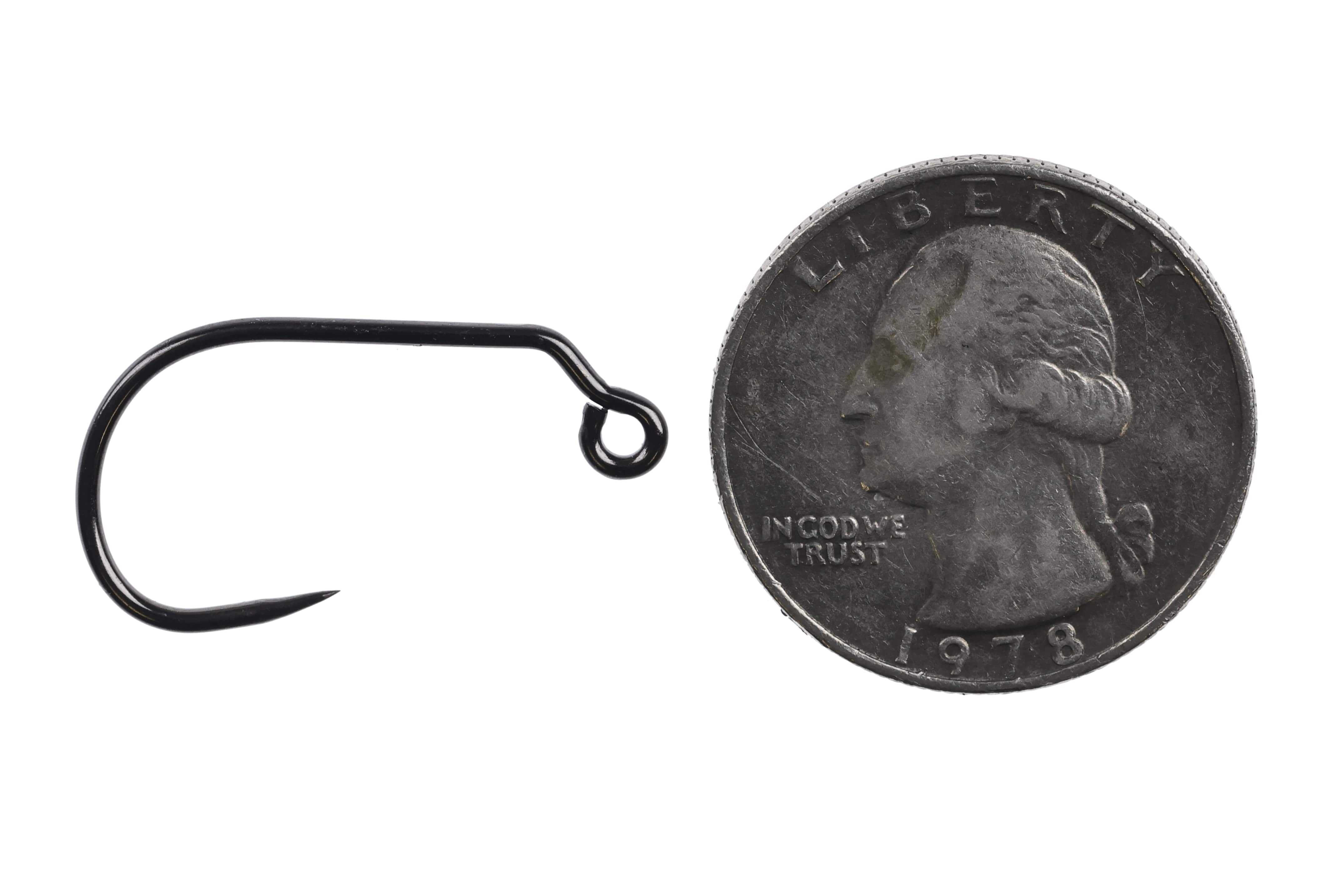Ahrex FW551 mini barbless jig hook glossy black steel with up-eye jig bend beside quarter for scale