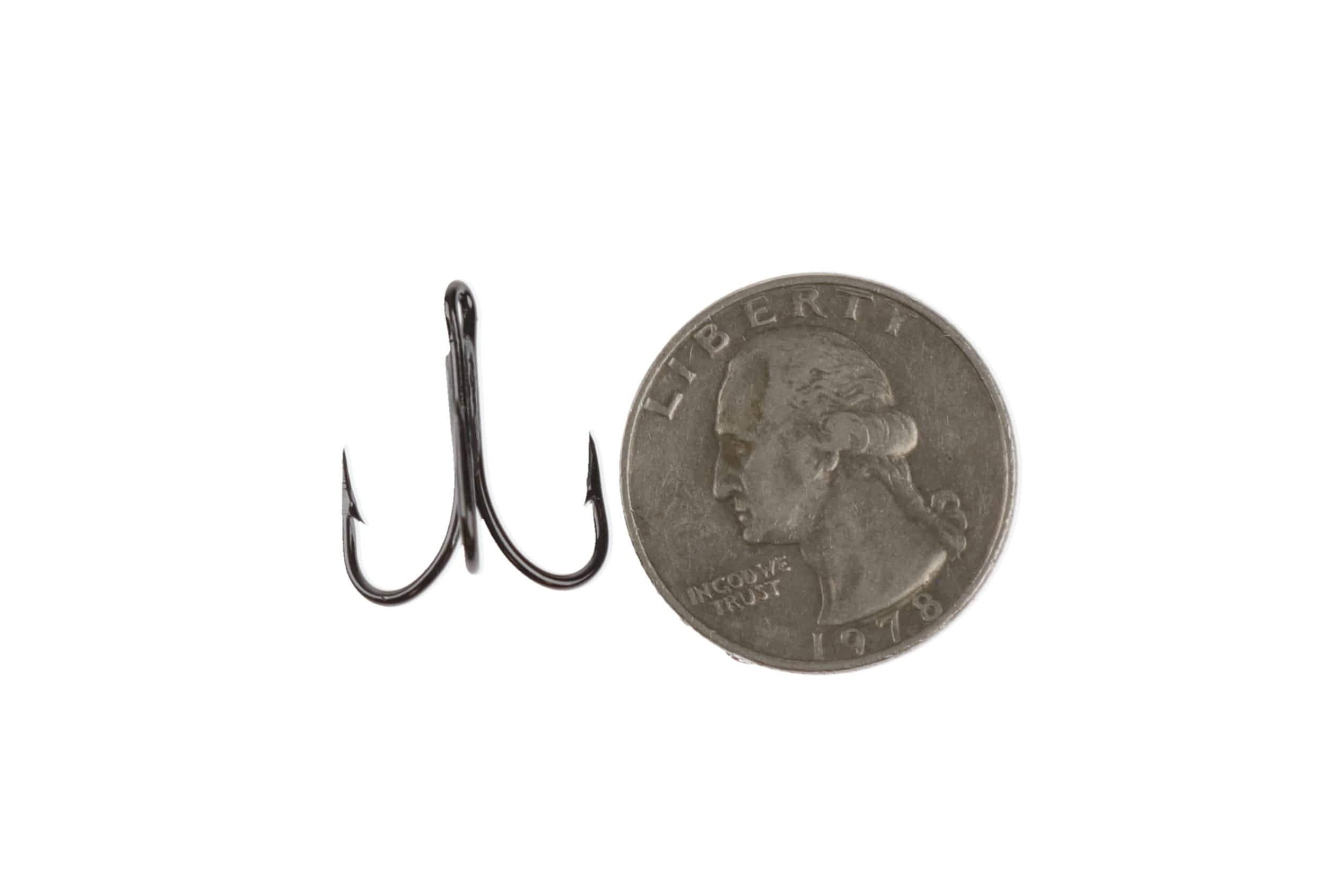 Black Ahrex HR450 treble hook with barbed points in glossy nickel finish shown beside US quarter for scale