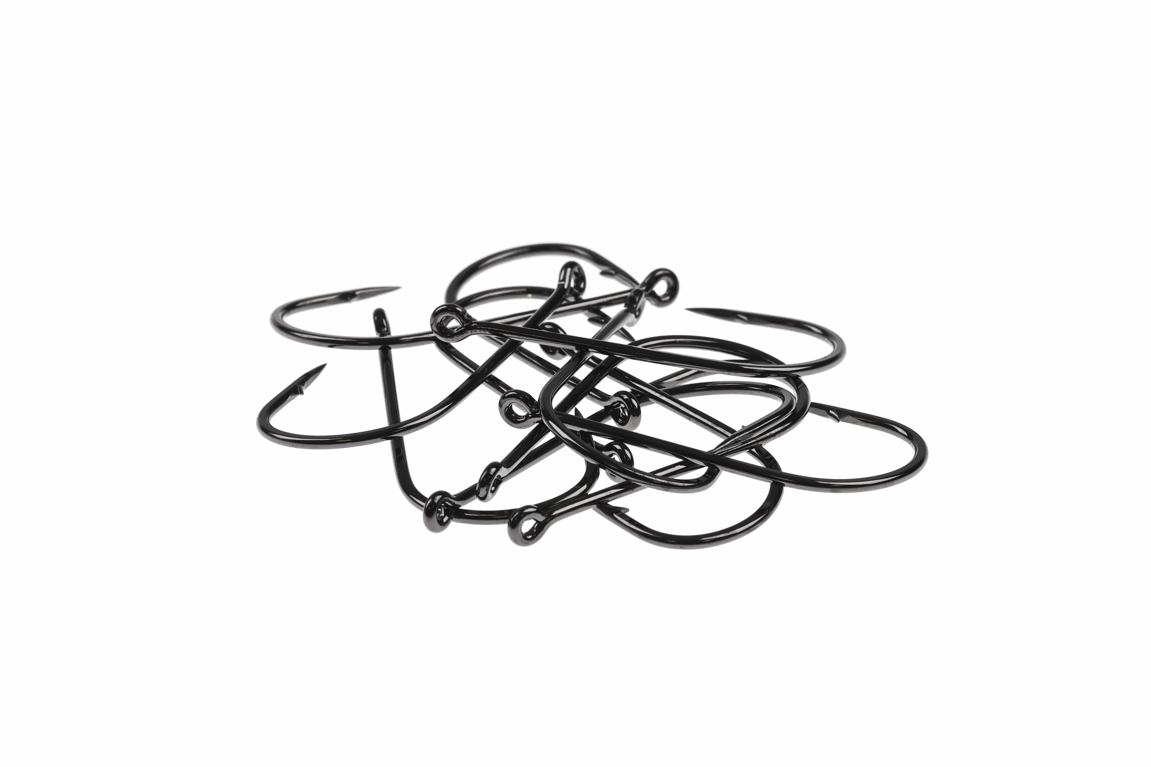 Pile of black glossy Ahrex short-shank streamer hooks with welded eyes and sharp points for fly tying