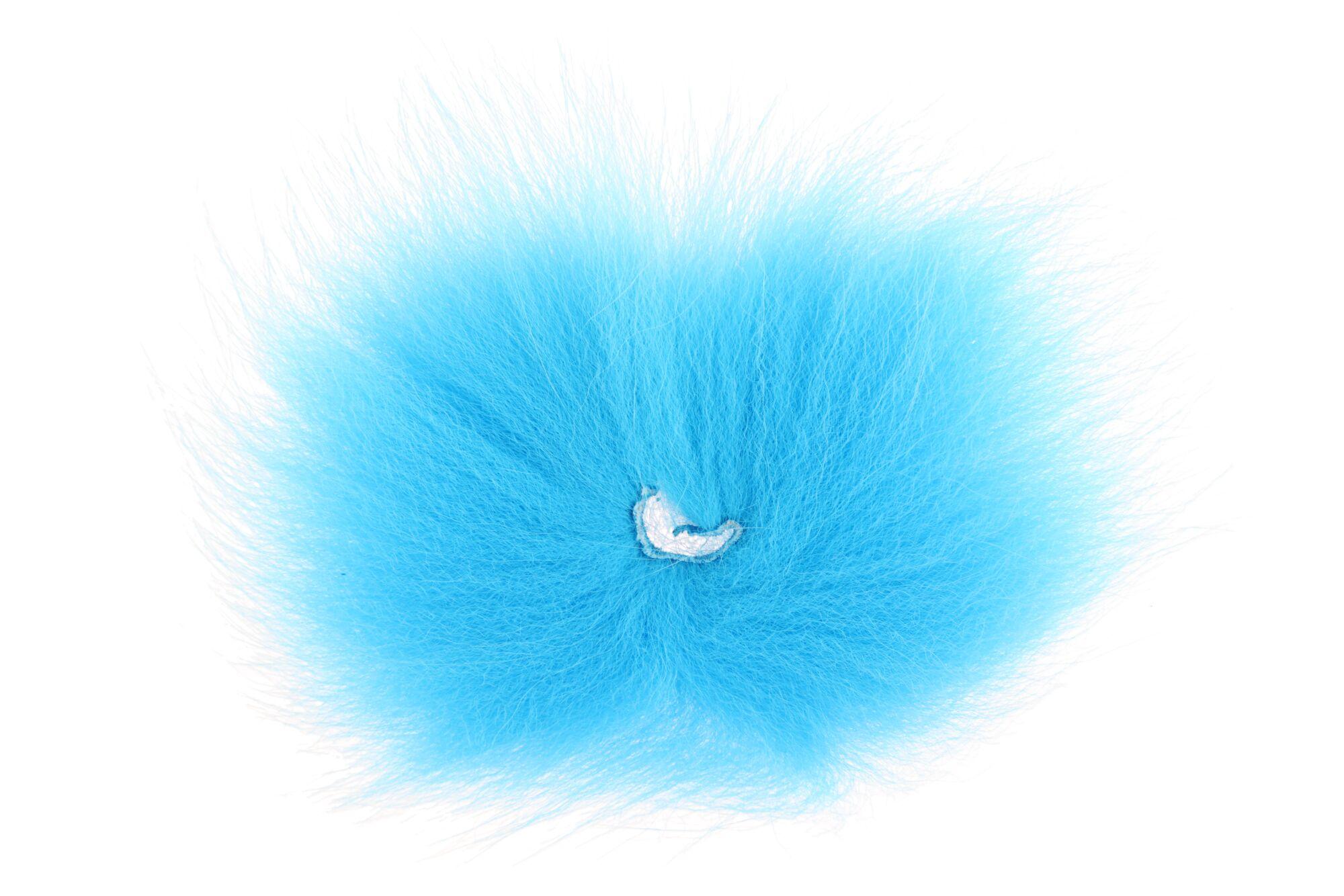 Round fluffy bright blue fox fur puff for fly tying with long soft hairs and stitched center.