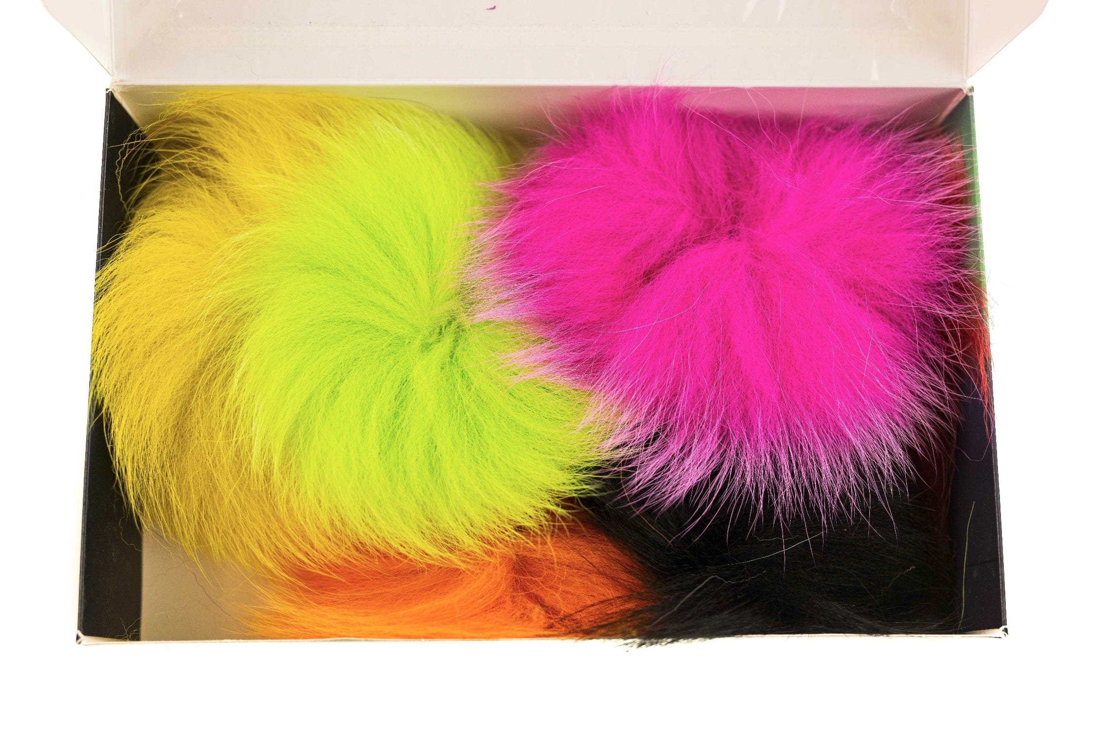 Arctic Fisherman blue fox fur pack for fly tying with neon chartreuse, hot pink, orange and black long, fluffy fur clumps