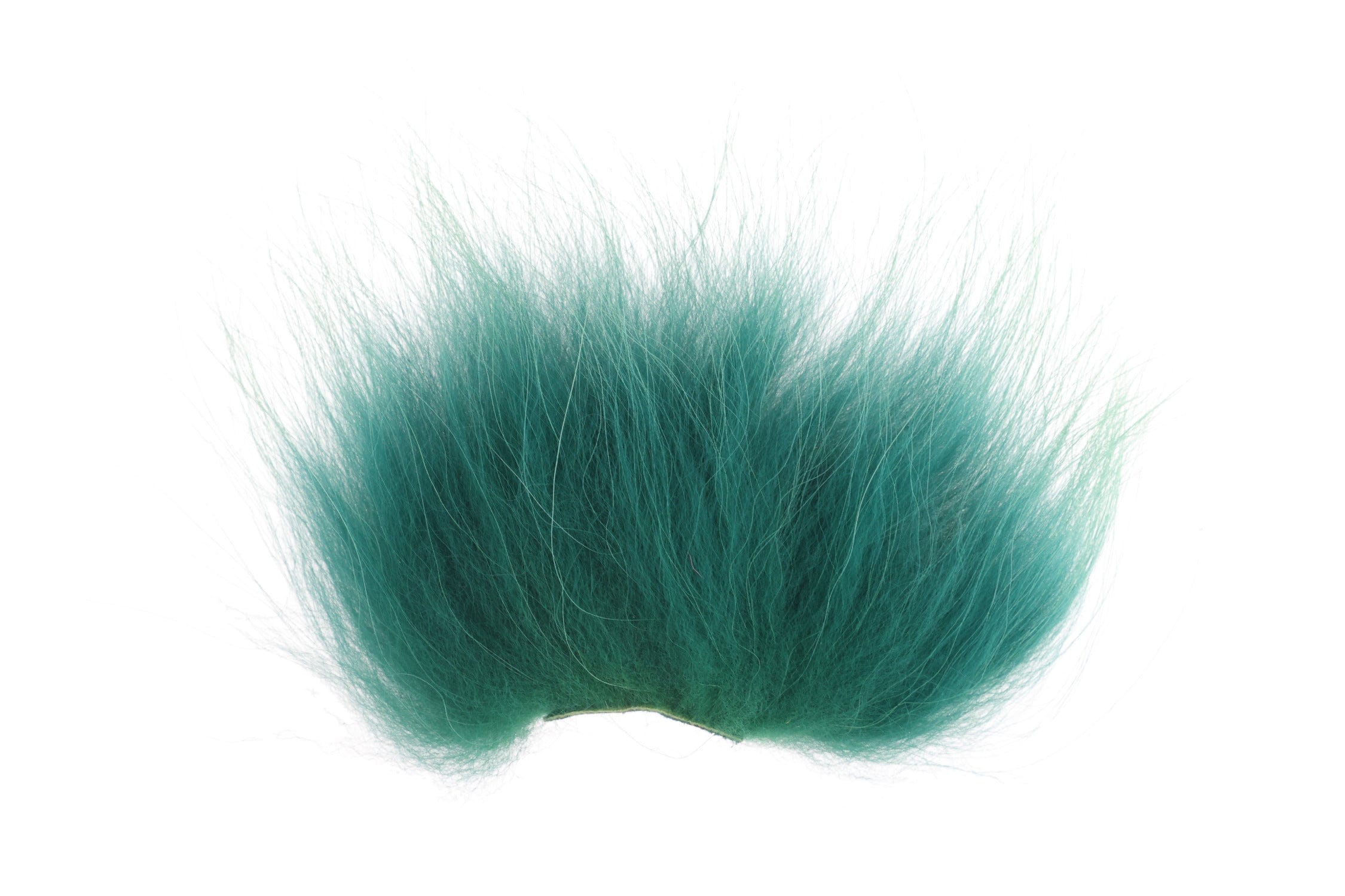 Teal raccoon fur strip with long fluffy guard hairs on a narrow base for fly tying