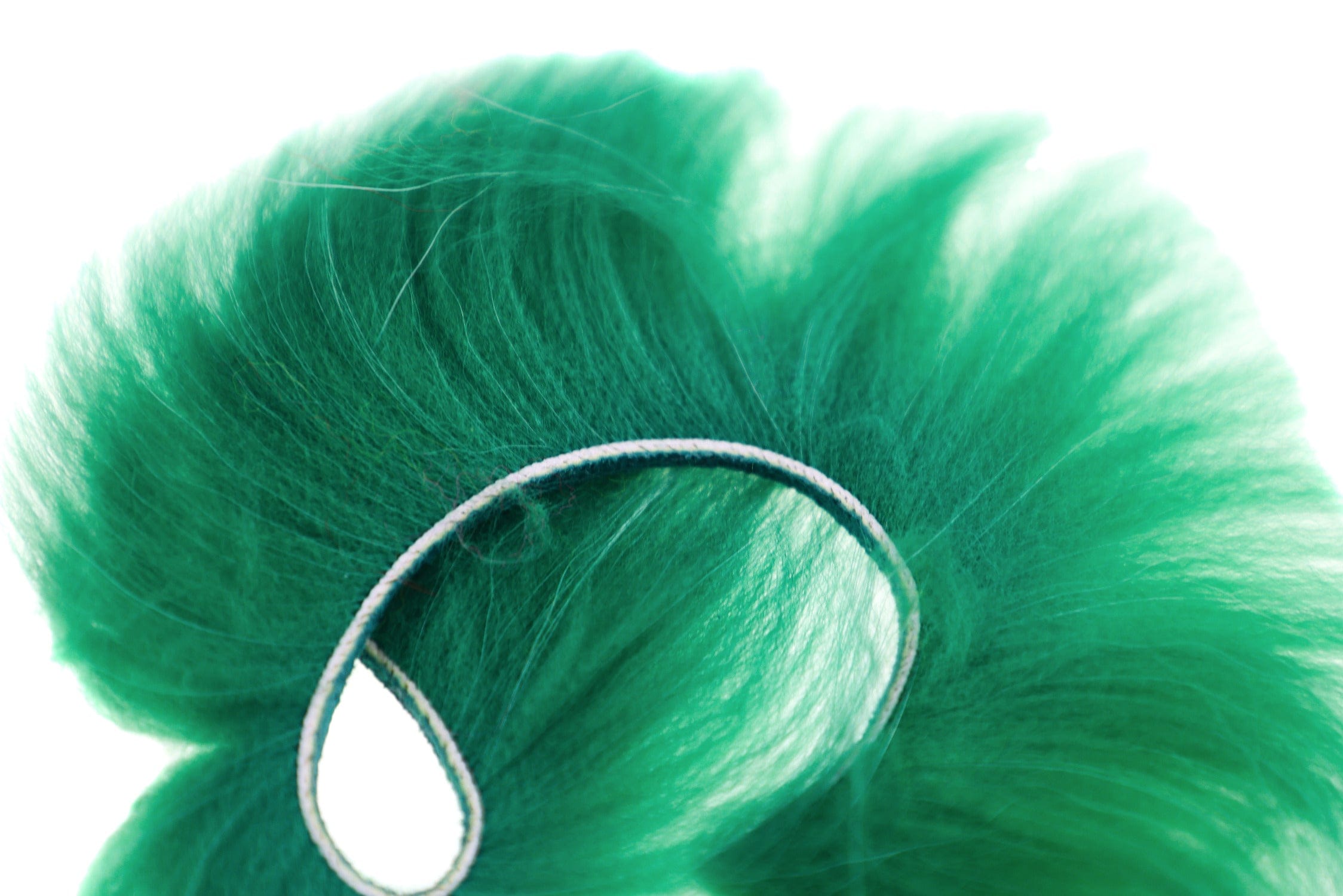 Emerald green raccoon zonker strips with long soft fur and center skin strip for fly tying lures