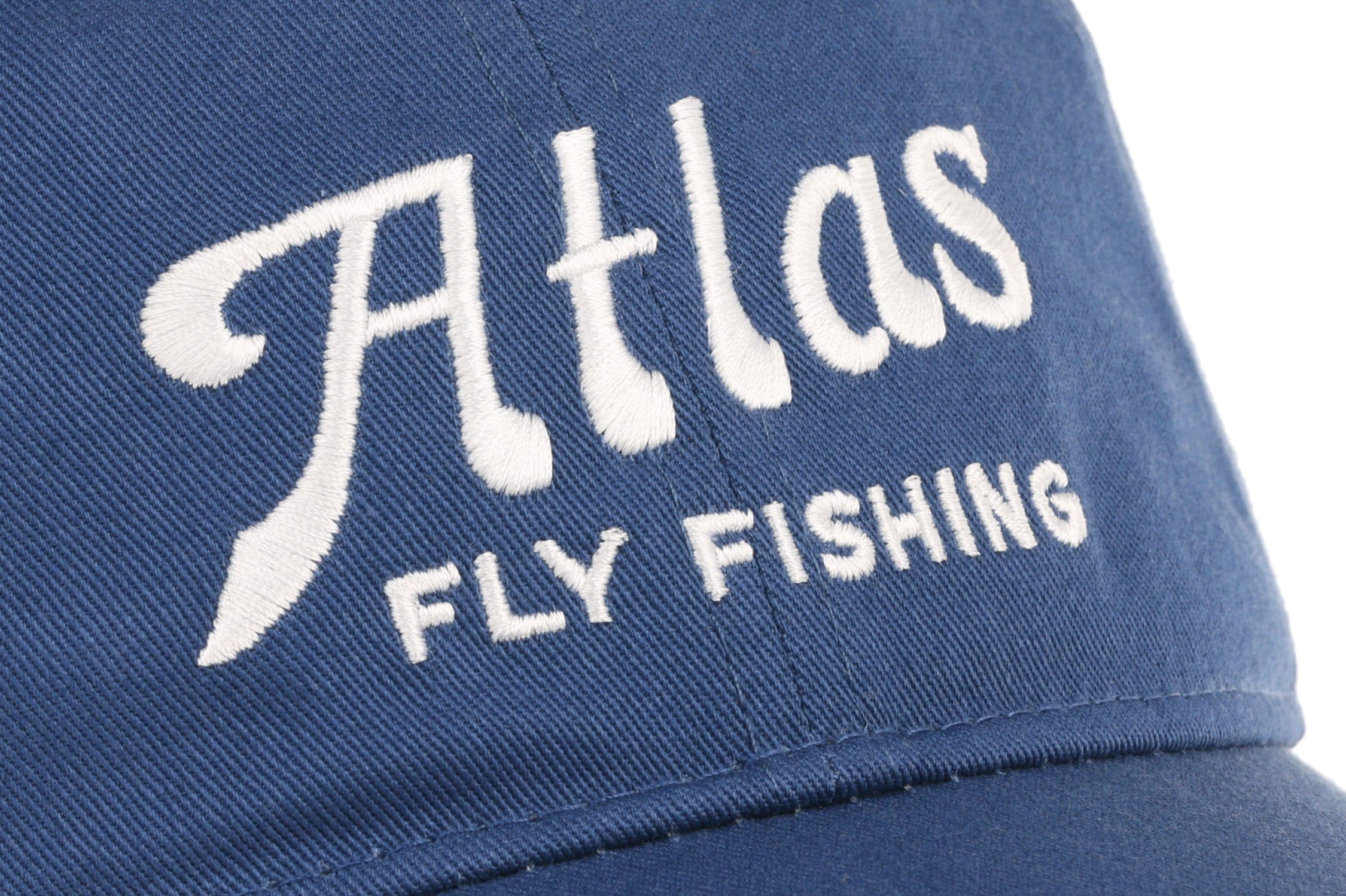 Blue cotton hat with white embroidered Atlas script logo and Fly Fishing text