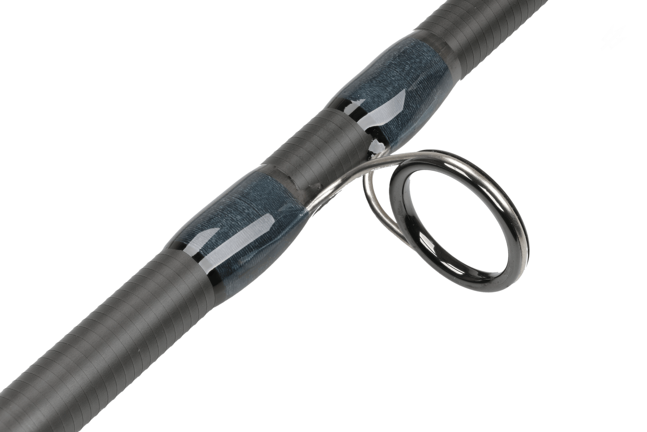 Atlas Signature 9ft 9wt fly rod close-up showing gray wrapped grip, glossy blue thread wraps and polished gunmetal guide ring