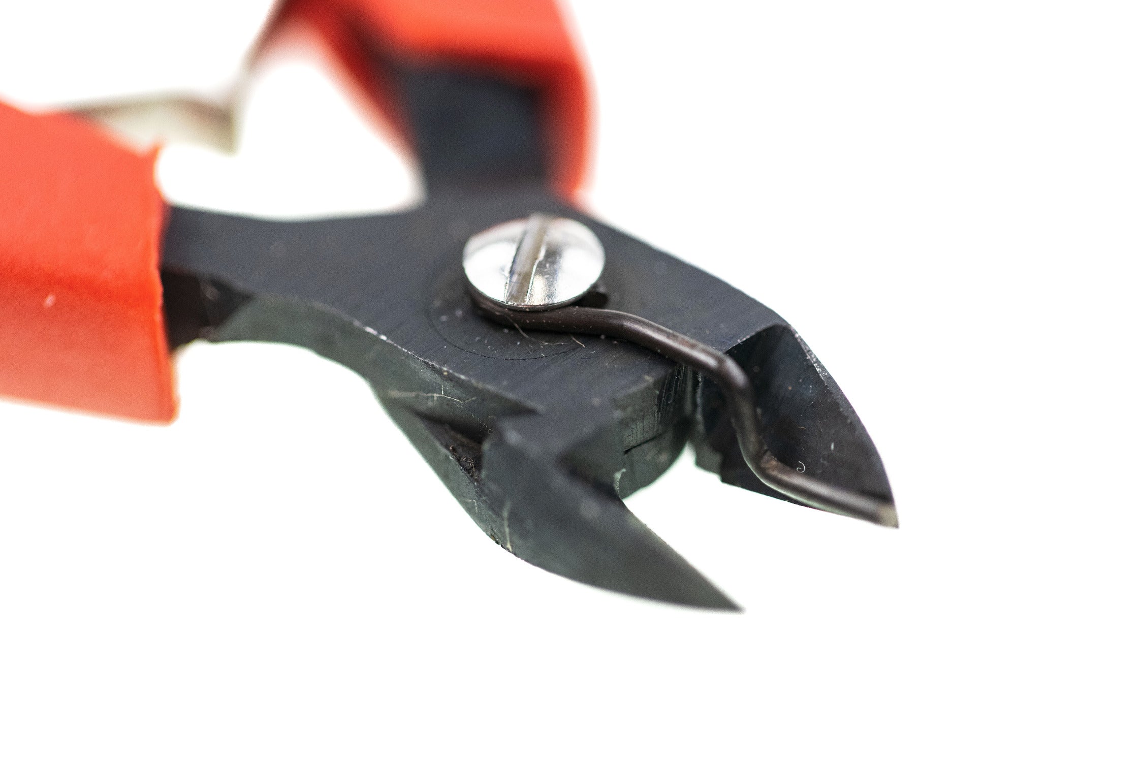 Red-handled Bead Buddy flush cutter with black steel jaws, wire catcher spring and silver pivot screw for fly tying