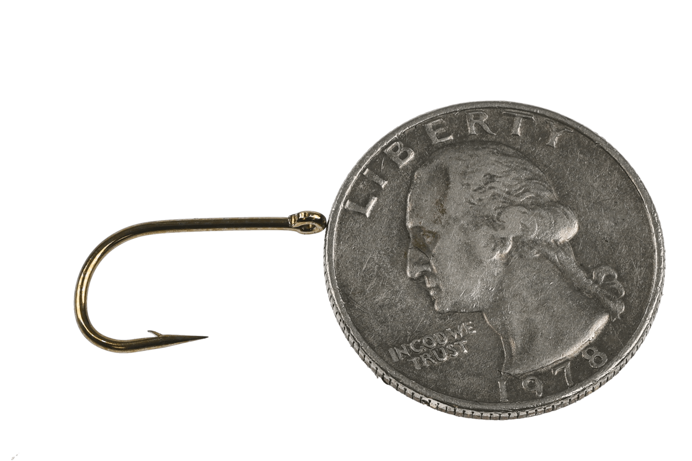 Brass-gold Core C1510 salmon egg hook with curved short shank and barb beside US dime for scale, fly tying hook
