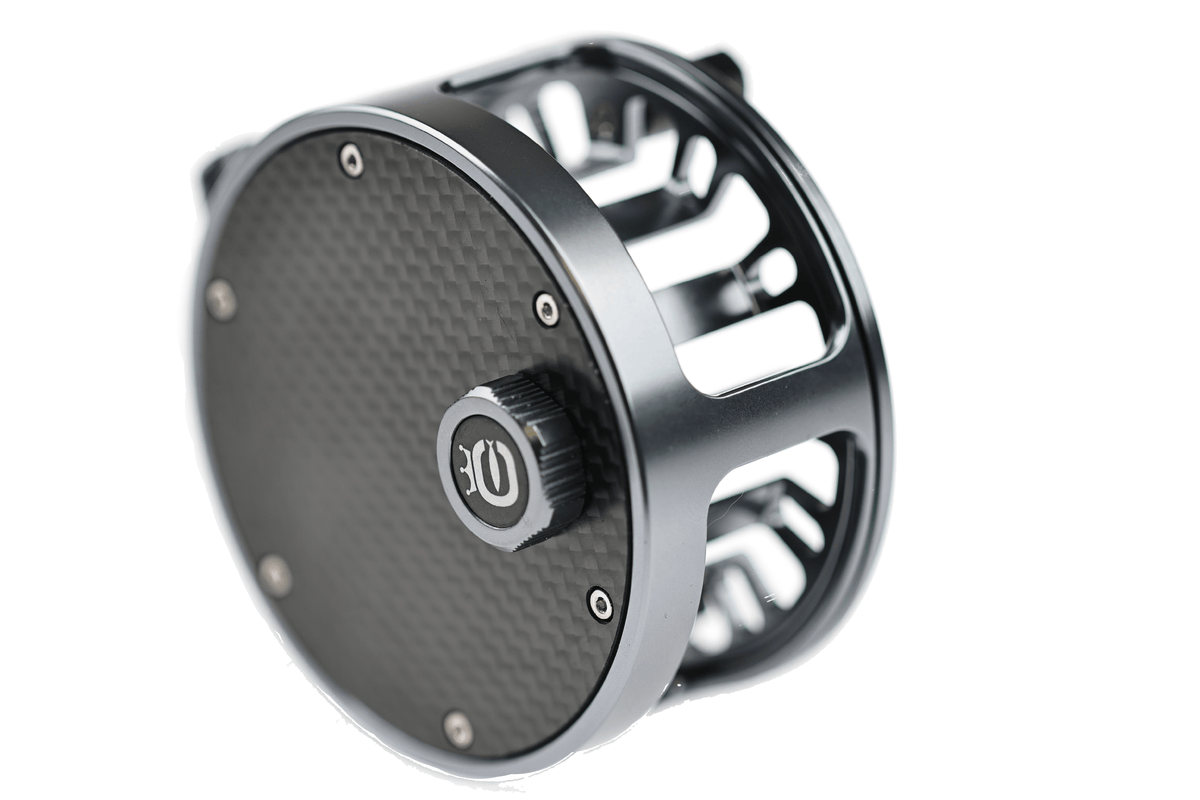 Cortland Retro Click Fly Reel with carbon fiber spool, silver aluminum frame, and vintage-style design for fly fishing