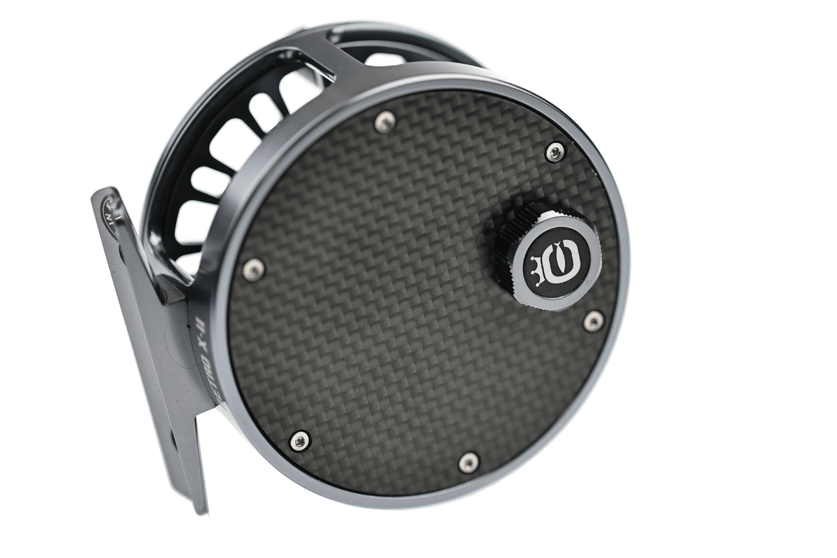 Cortland Retro Click Fly Reel in gunmetal gray with carbon fiber drag disc and exposed mechanical click system