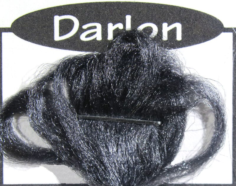 Black glossy Darlon synthetic fiber bundle on card, shiny hair-like strands for fly tying flies