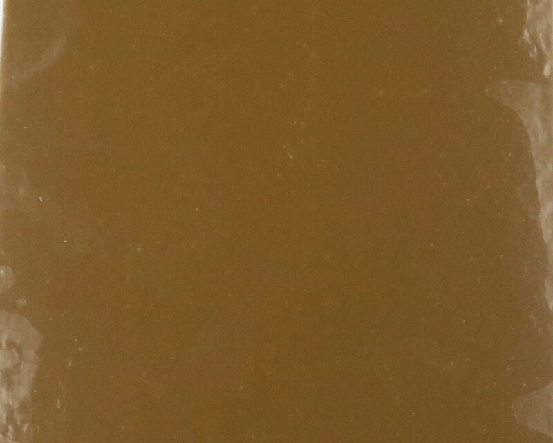 Brown Fino Skin fly tying sheet with smooth surface and glossy plastic packaging edges