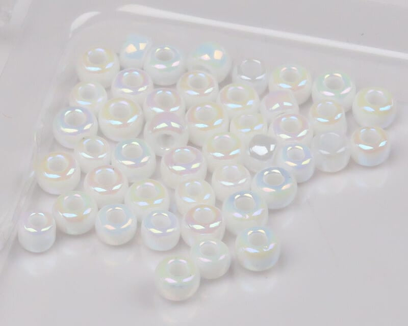 Pearlescent white iridescent glass beads for fly tying, round donut shape with glossy finish and center holes
