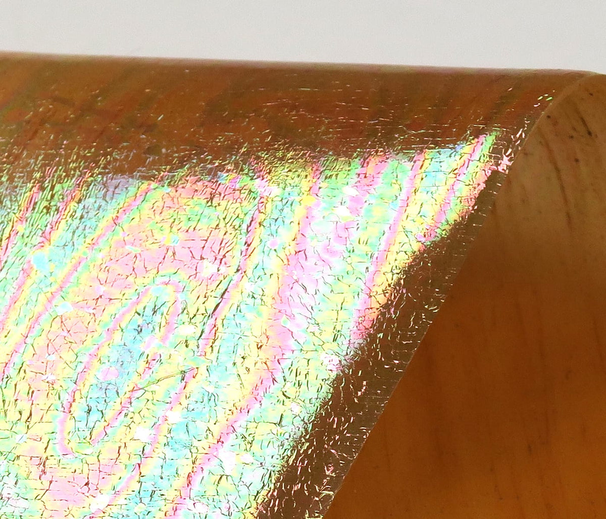 Iridescent UV Chewee Skin sheet with cracked holographic foil in pink, green and blue for fly tying