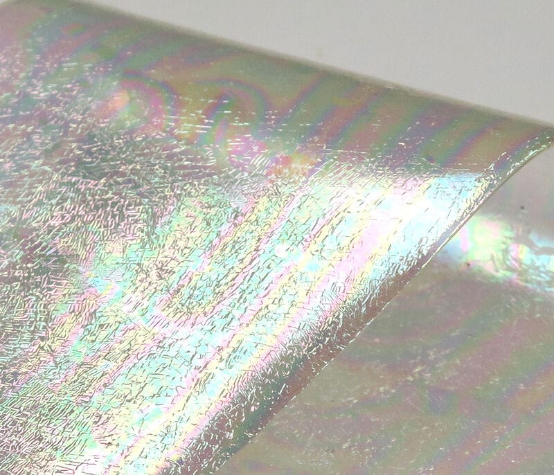Iridescent pearlescent UV Chewee Skin sheet with cracked holographic texture for fly tying