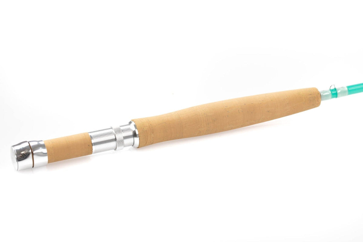 Echo River glass fly rod with tan cork handle, polished silver reel seat and translucent teal glass blank