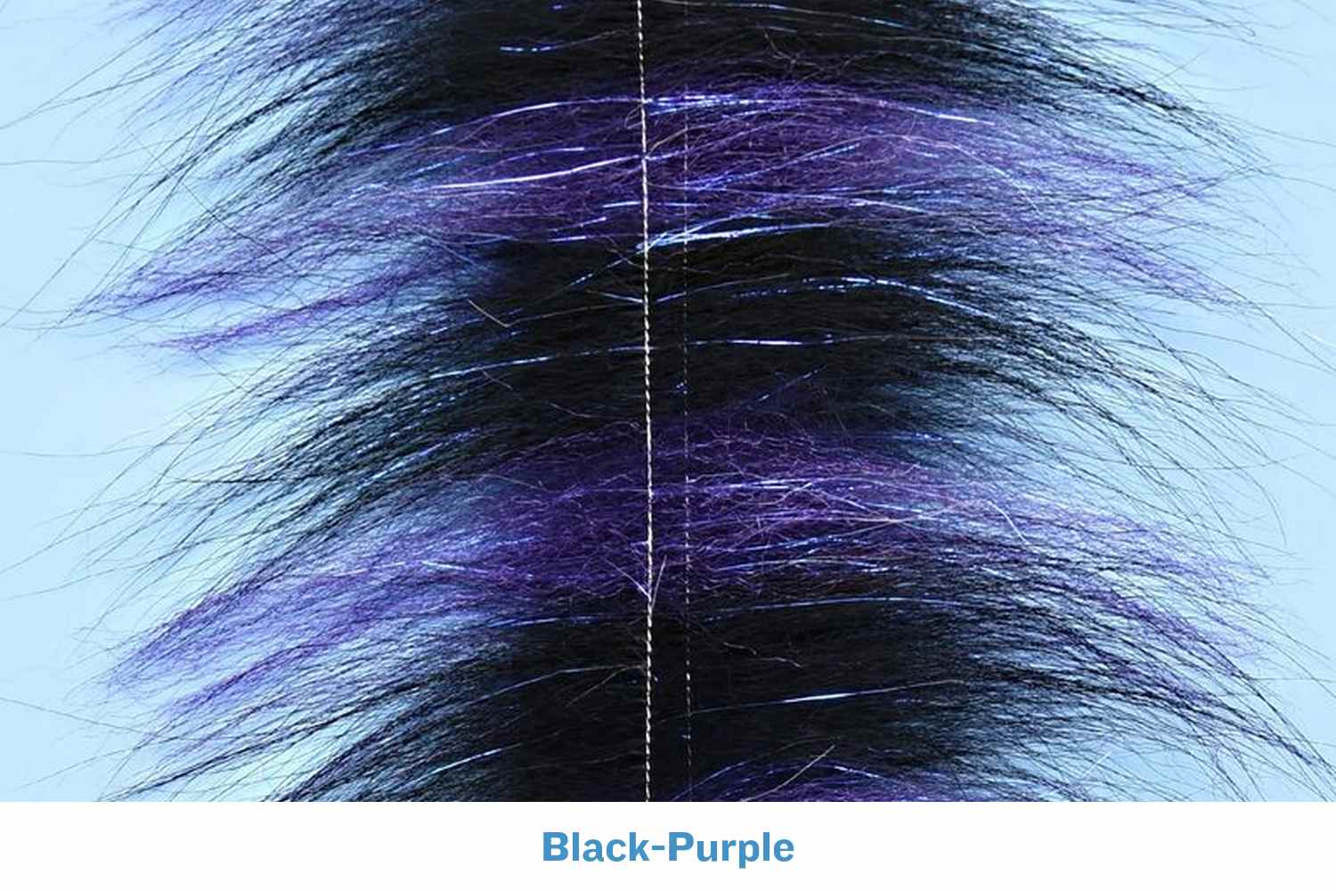 Black-purple Enrico Puglisi Grizzly Foxy Brush with long wispy synthetic fur and purple flash fibers for fly tying