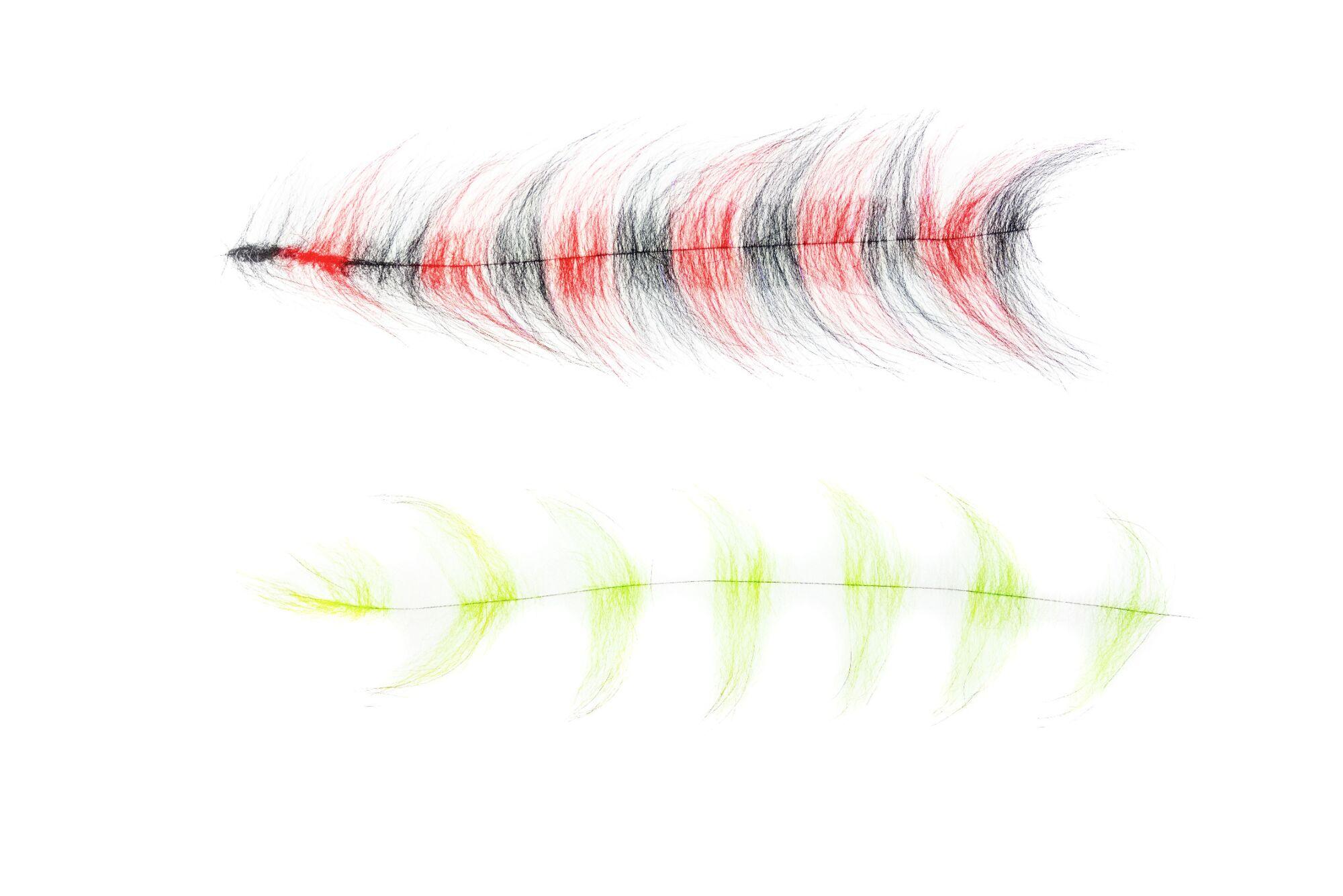 Black and red grizzly-style synthetic foxy brush strip with flowing hair tufts for fly tying