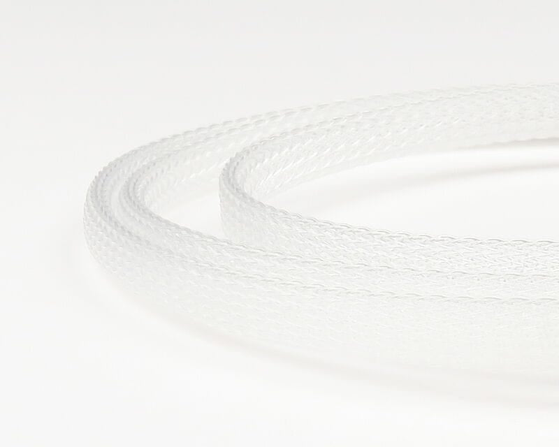 Clear translucent braided body tubing coiled, Fish-Skull fly tying material with textured nylon mesh