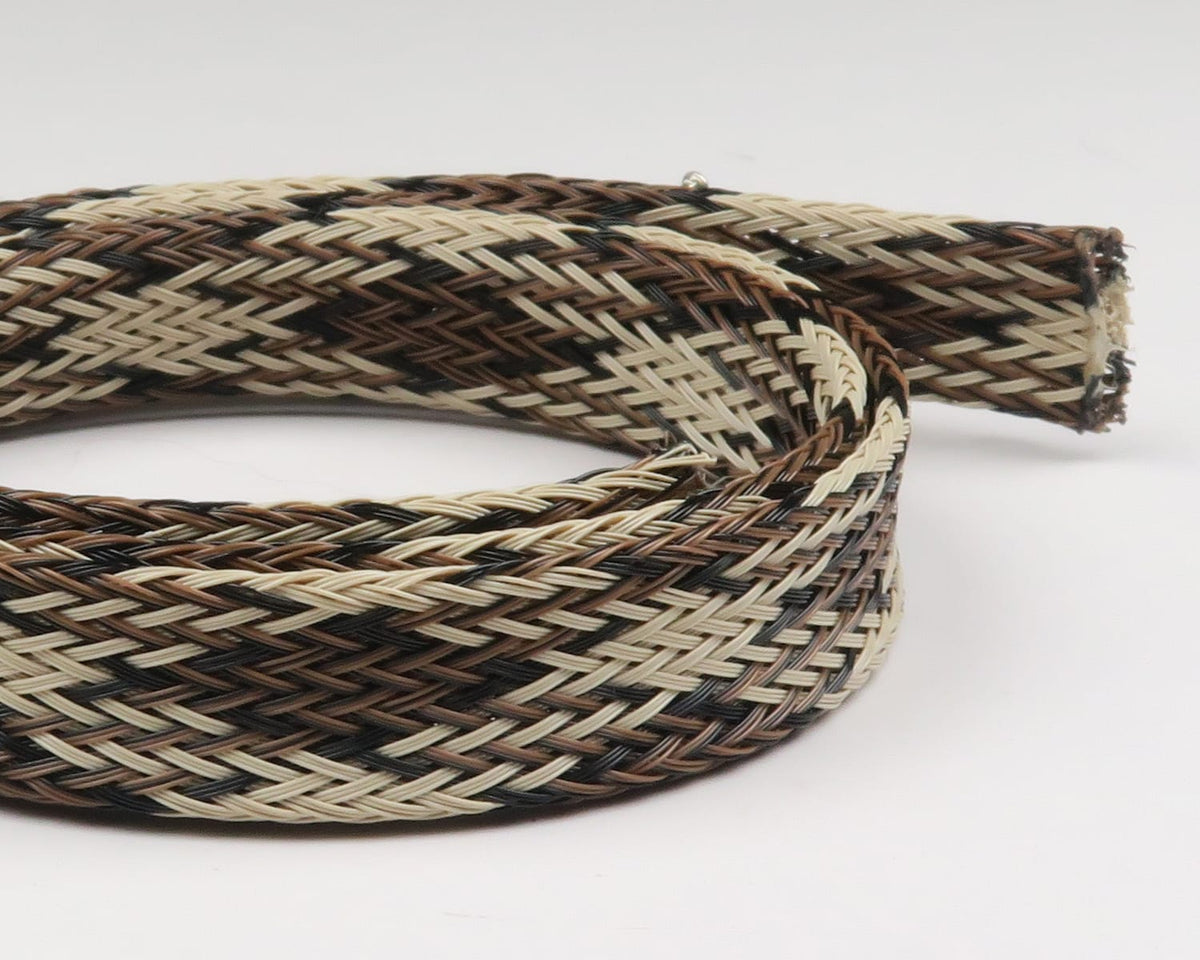 Braided body tubing for fly tying in tan, brown and black woven synthetic strands