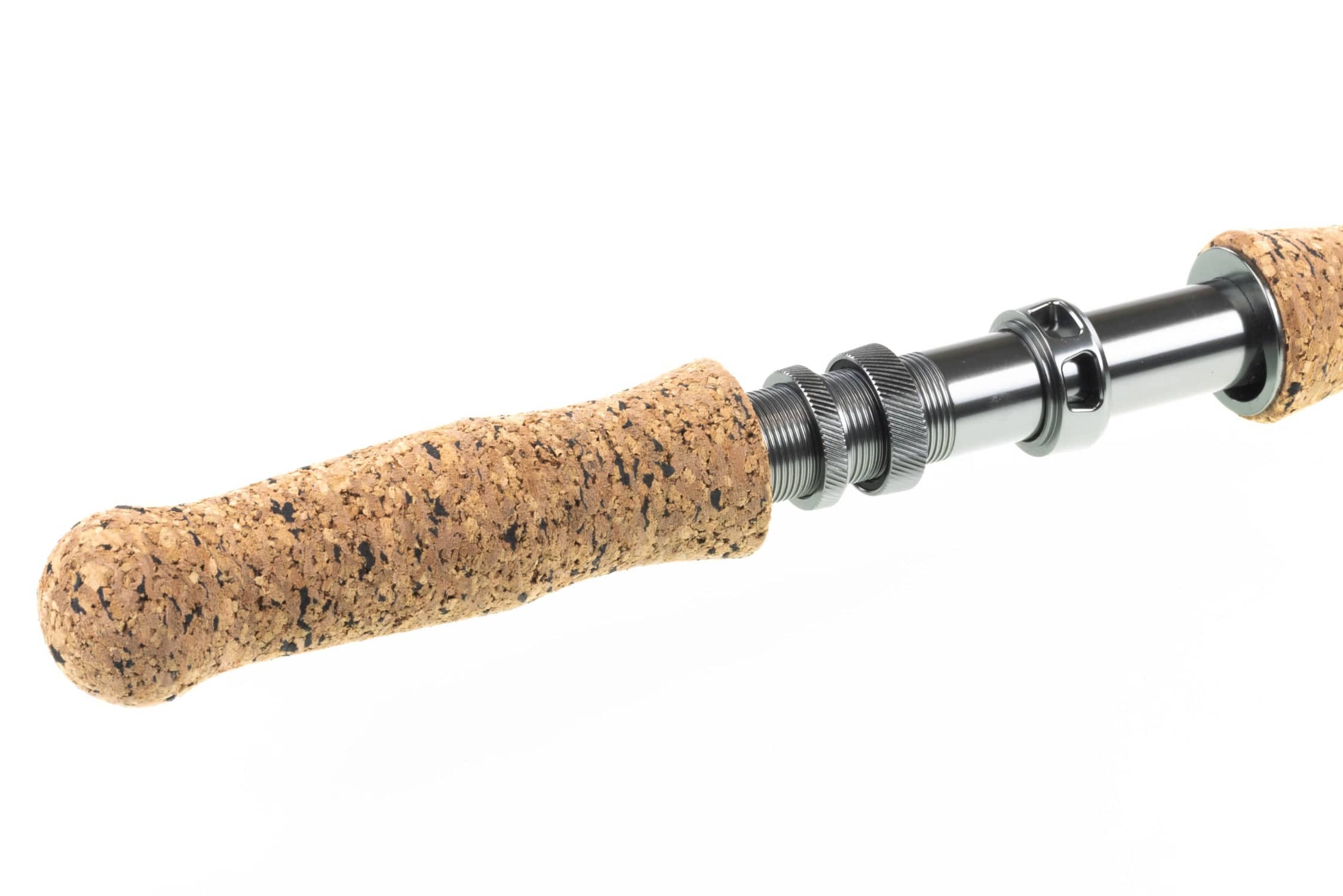 G. Loomis IMX-Pro musky fly rod cork handle with speckled tan grip, glossy gunmetal reel seat and knurled locking rings
