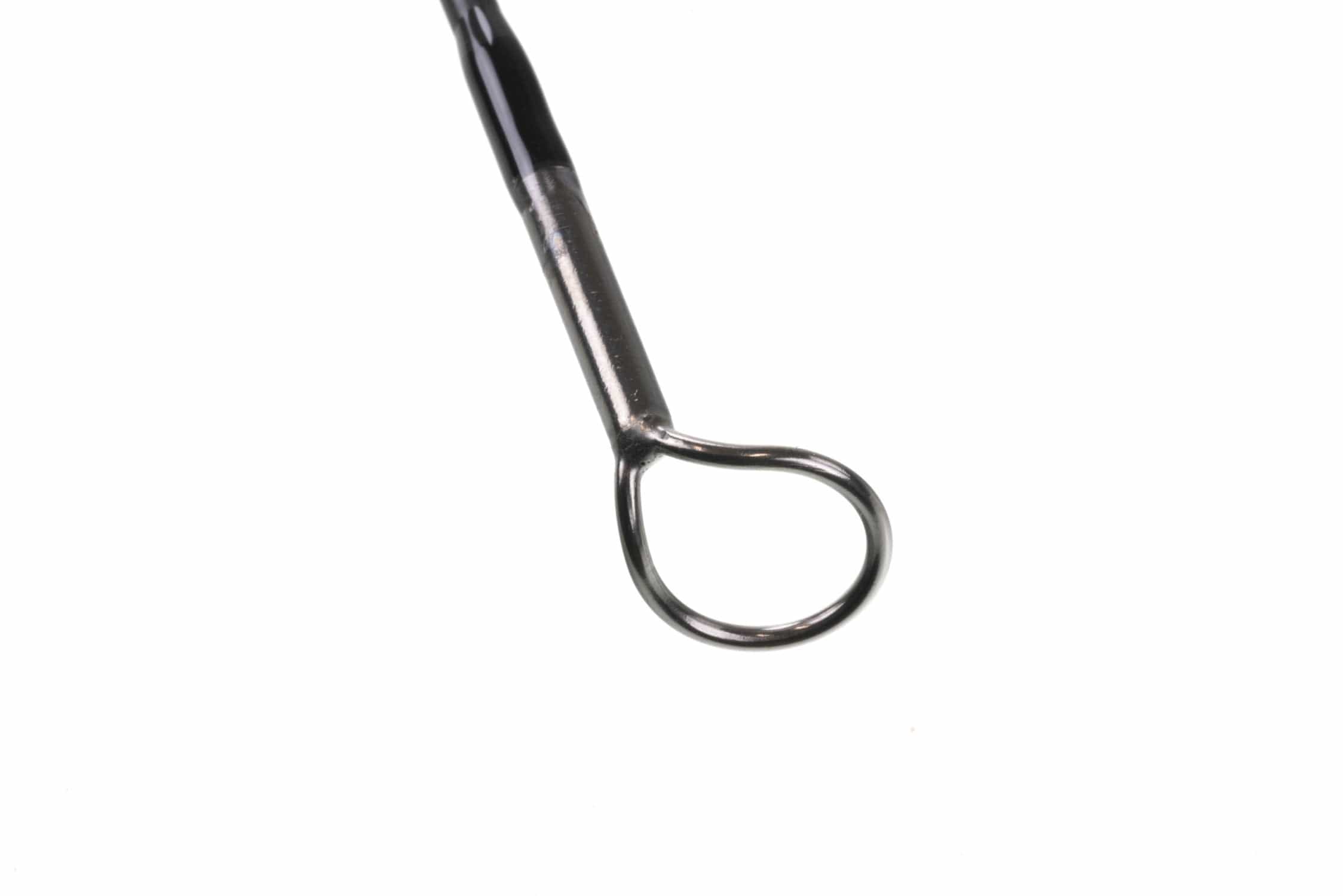 G. Loomis IMX-Pro musky fly rod close-up of glossy black carbon blank and polished metal guide ring