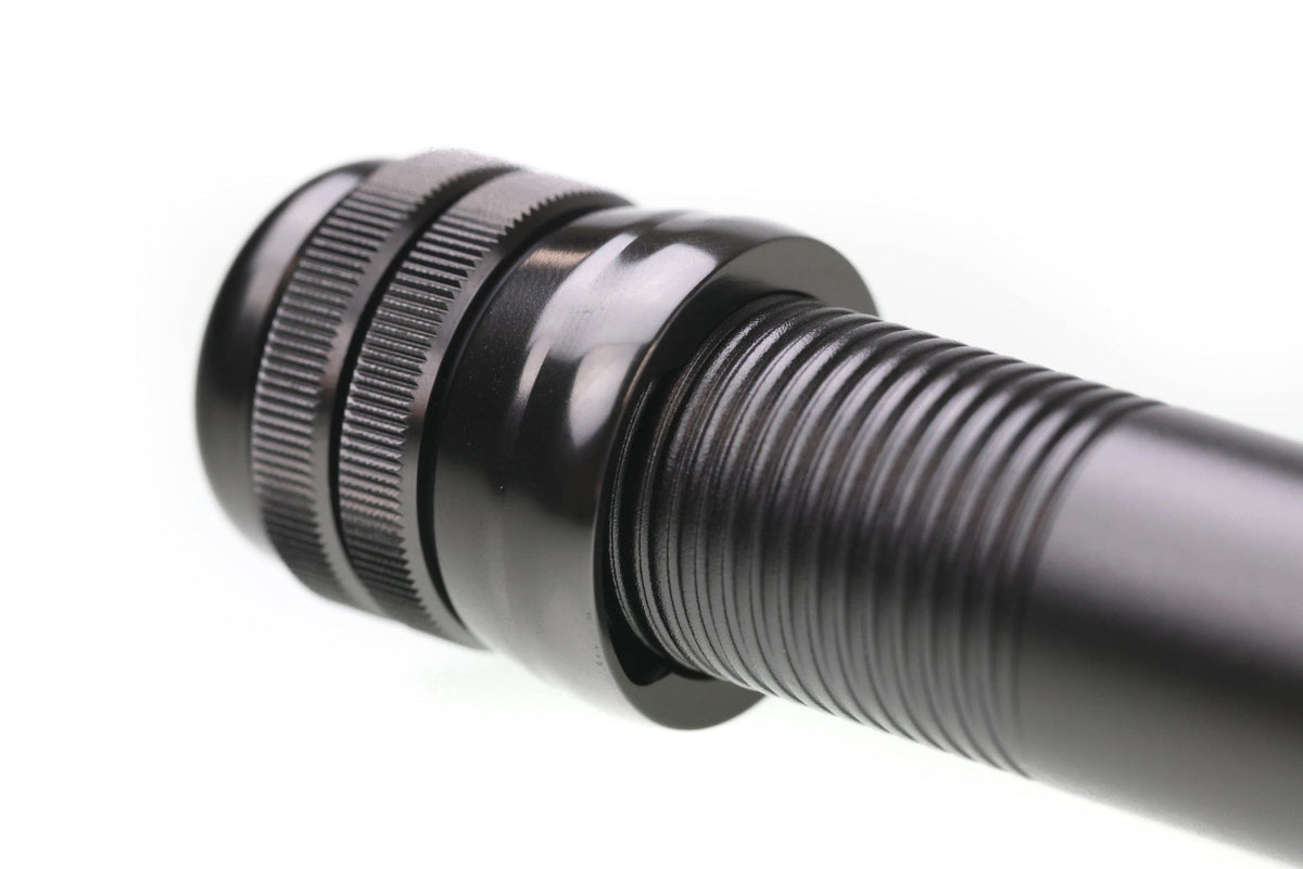 Greys Lance fly rod black anodized metal reel seat with knurled rings and ribbed carbon handle close-up