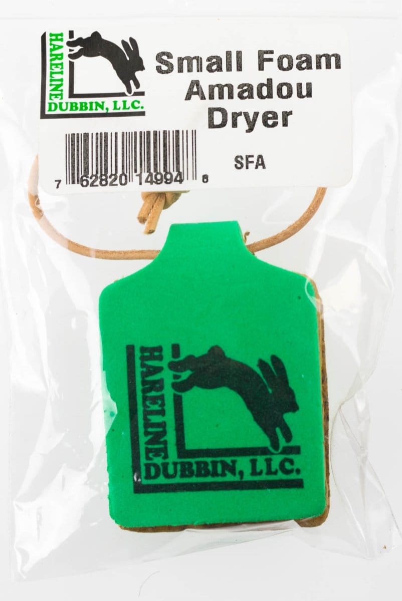 Small green foam amadou dryer tag with black Hareline rabbit logo and tan leather cord, foam fly-tying accessory