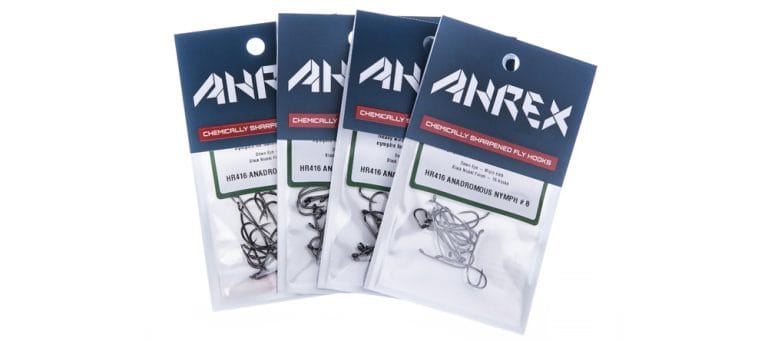 Four clear retail packs of Ahrex HR416 Anadromous nymph fly tying hooks, dark gunmetal curved hooks with navy header cards