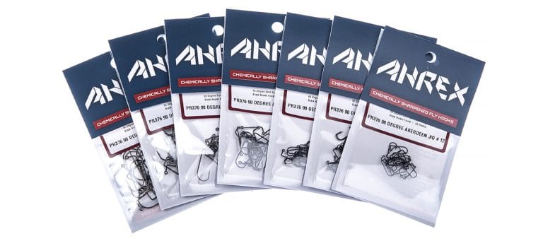 Ahrex PR376 90 degree Aberdeen jig hooks in clear packets, black steel hooks with navy header cards, fly tying