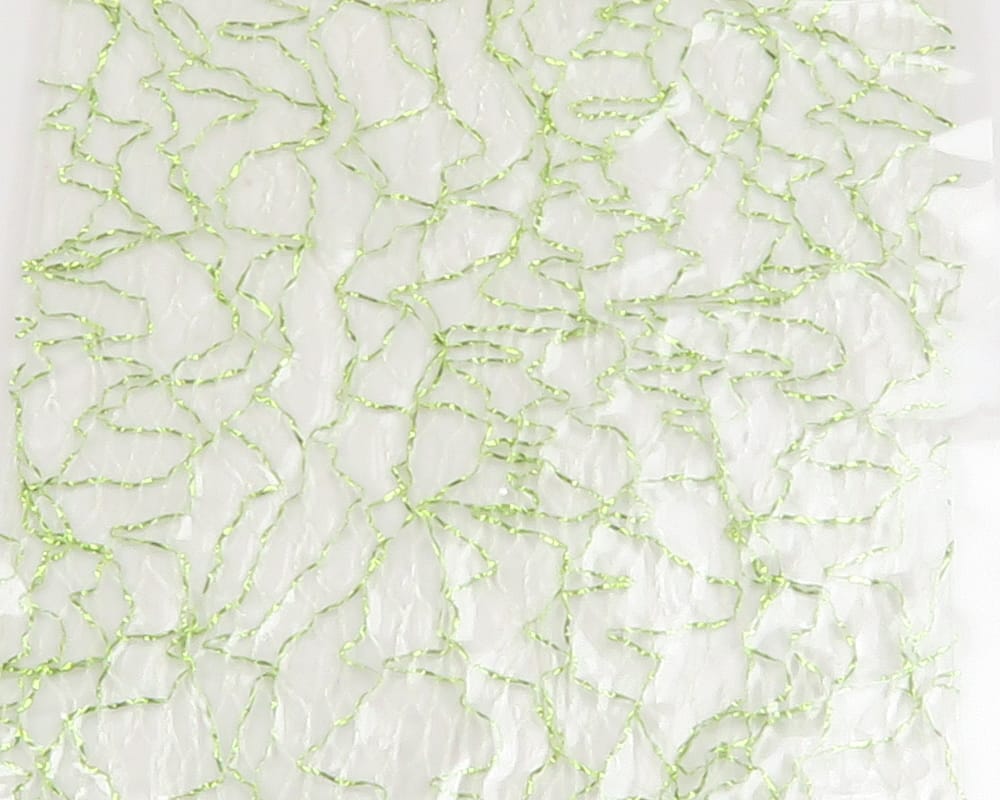 Translucent crinkled gummy wings sheet with lime-green twisted strand veins for fly tying, soft plastic wing material