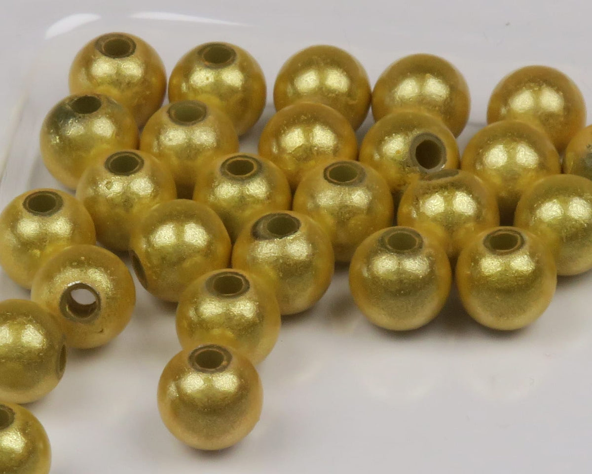 Hareline metallic gold round beads with central holes and glossy reflective finish for fly tying