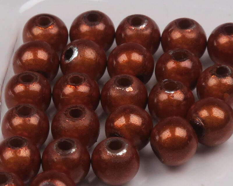 Metallic copper Hareline 3D round beads with glossy shimmery finish and center holes for fly tying