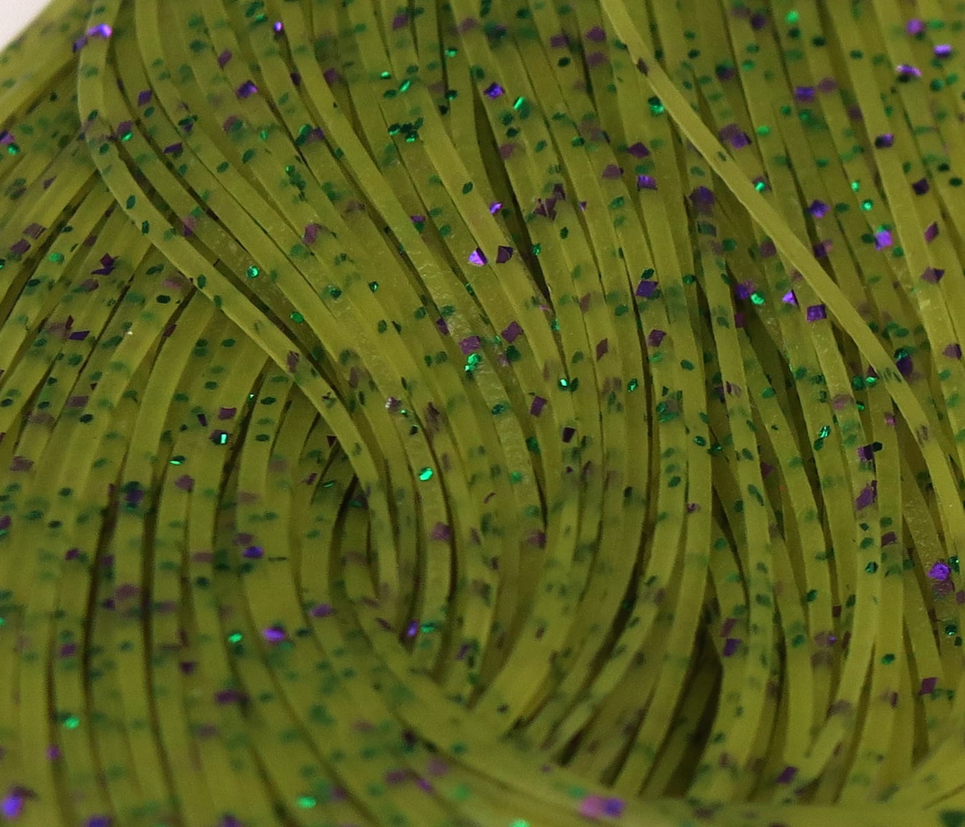Chartreuse olive silicone Crazy Legs rubber strips with green and purple holographic flakes for fly tying, thin strands