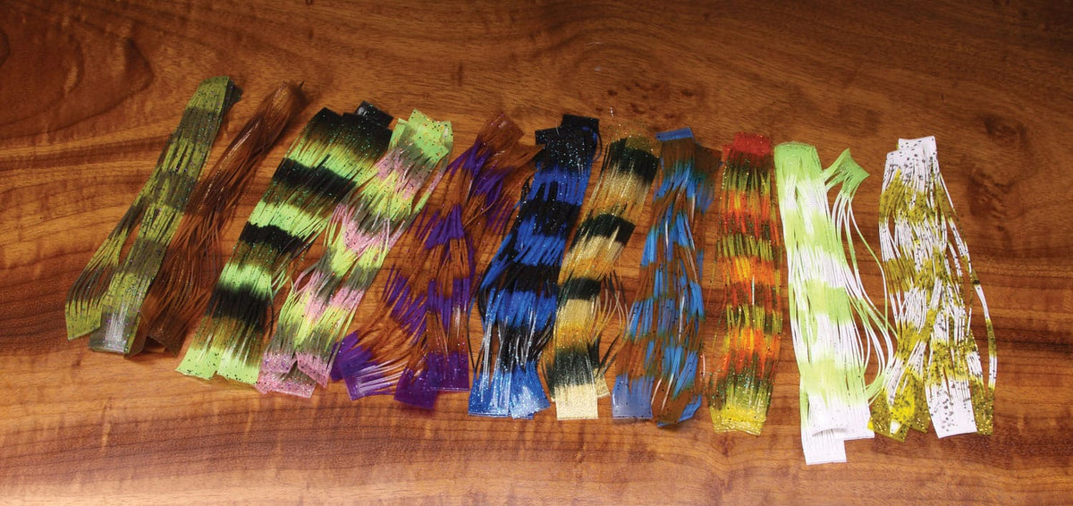 Hareline Fly Enhancer legs assorted glittered silicone strips in green, blue, orange, white with black bands for fly tying